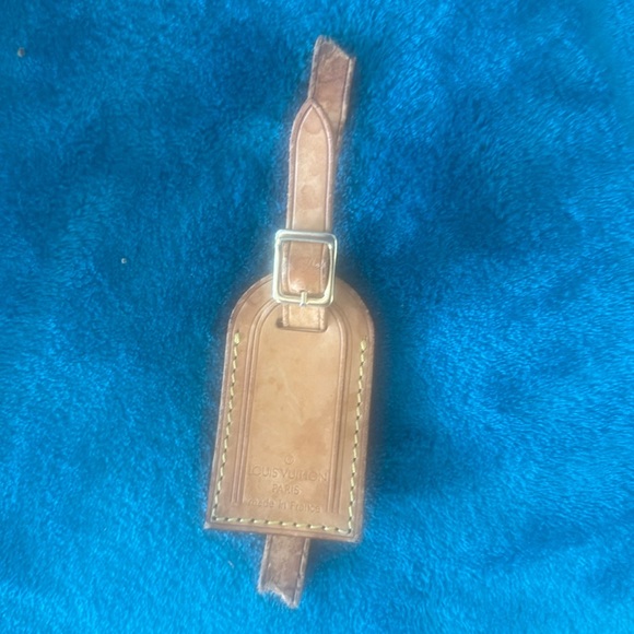 Louis Vuitton and LV wallet included.  There is 2 small marks on the inside - Picture 14 of 16